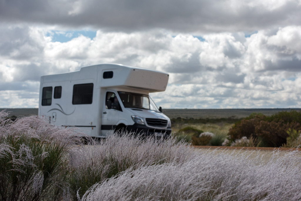 a large camper van on a desert