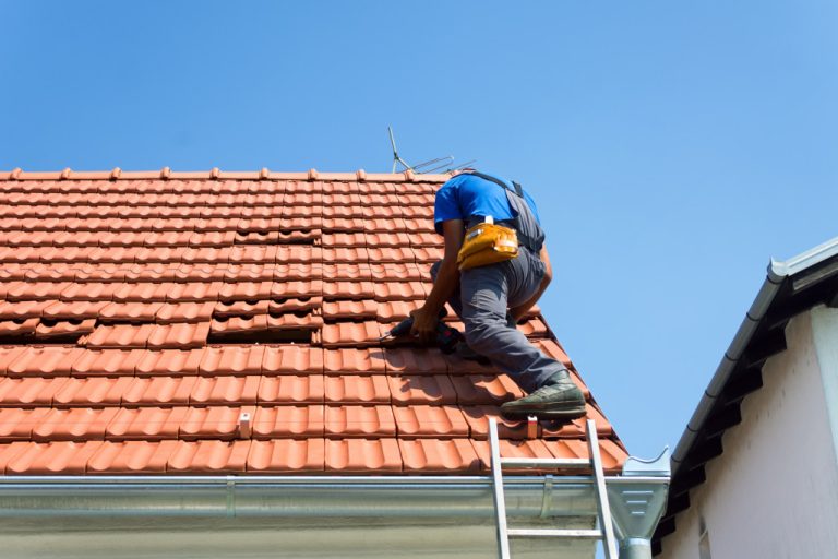 A worker on a roof