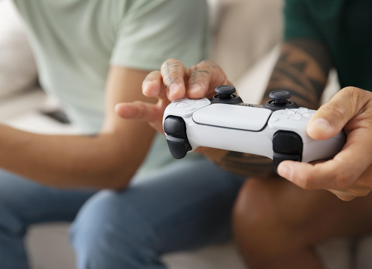 close-up of hand holding an Xbox controller