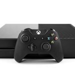 black Xbox console with a controller